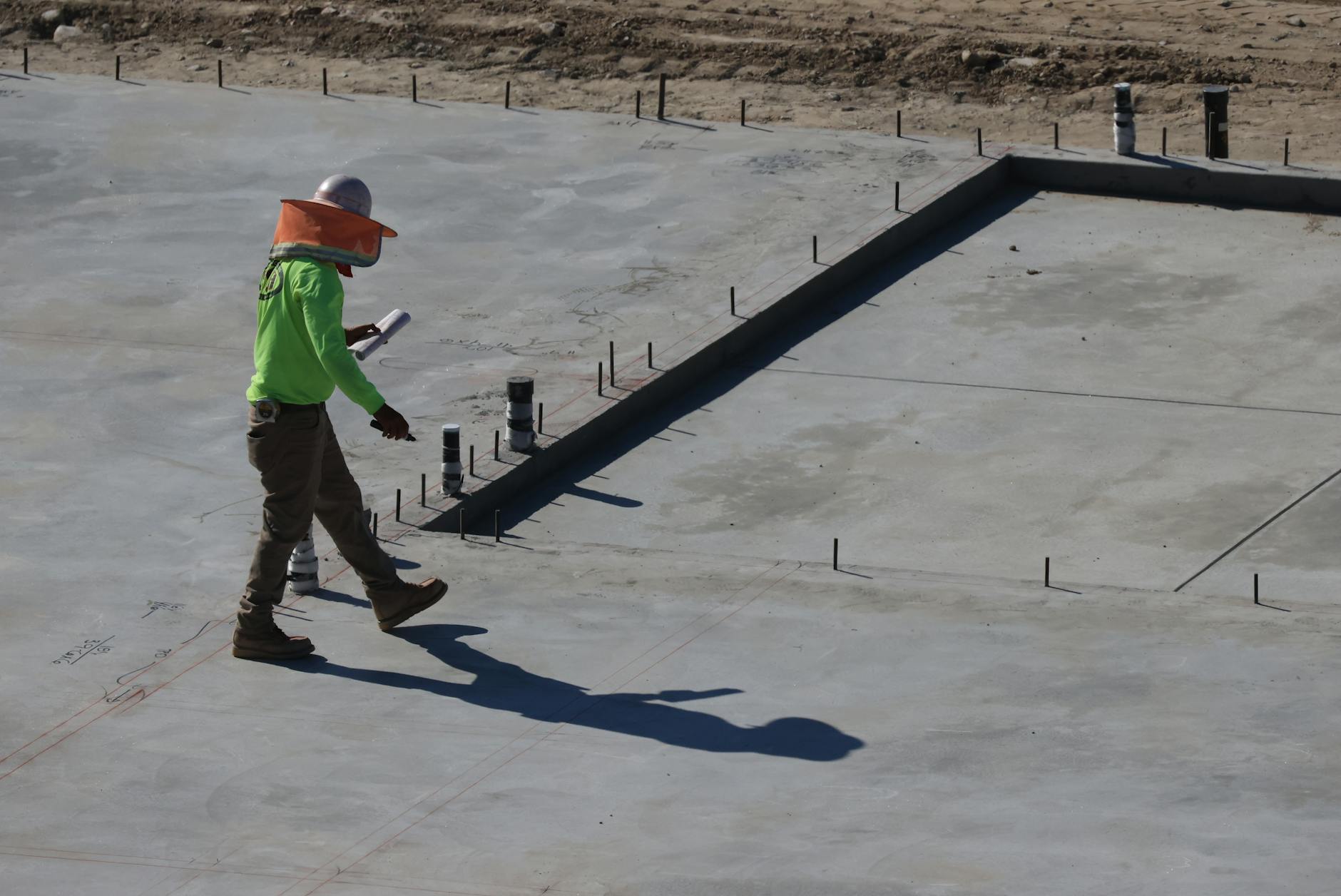 Concrete foundation being poured for new construction in NJ